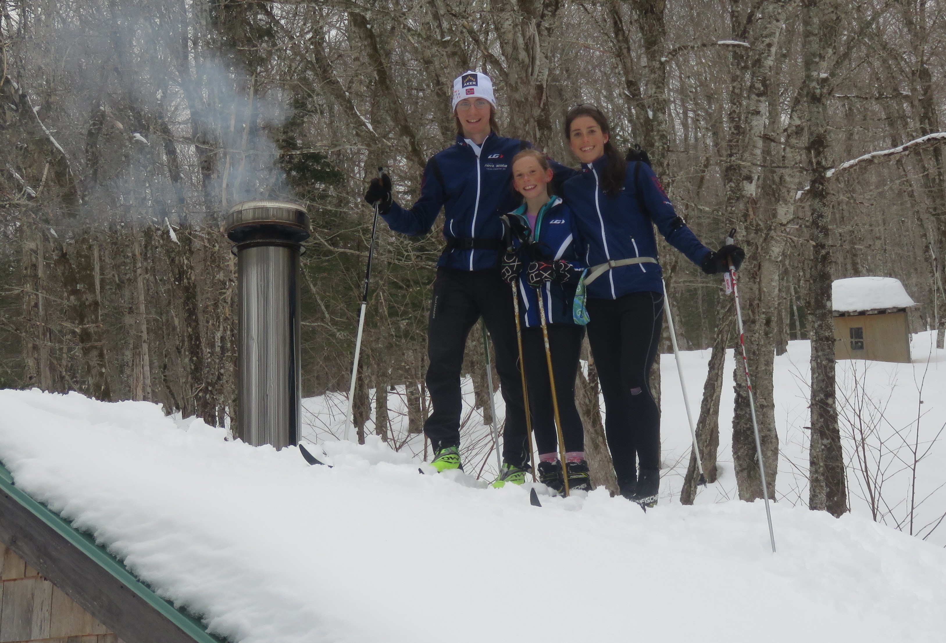 Zoom in Colin, Maggie & Fiona rooftop.JPG